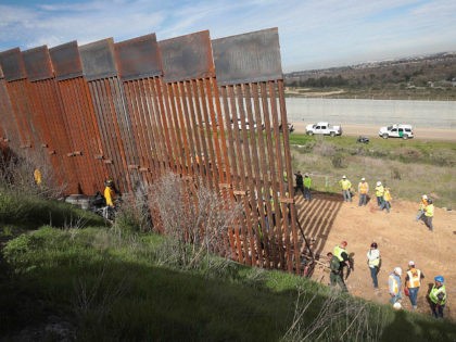 TIJUANA, MEXICO - JANUARY 28: Construction of the U.S. border wall is halted after a car r