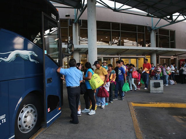 MCALLEN, TX - JULY 25: Central American immigrants just released from U.S. Border Patrol d