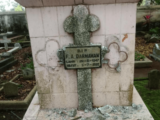 A desecrated Christian grave at Giriloyo Cemetery in Magelang town, Central Java province.