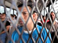 A group of undocumented immigrants being transported by ICE to airport for deportation ( Scott Olson/Getty )