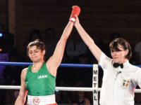 Iran's Sadaf Khadem (L) is designated as winner at the end of her amateur 3 rounds boxing match against France's Anne Chauvin (R) on April 13, 2019 in Royan, western France. - Sadaf Khadem became today the first Iranian woman to contest an official boxing fight. (Photo by MEHDI FEDOUACH …