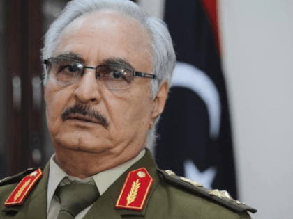 FILE -- In this March 18, 2015 photo file photo, Gen. Khalifa Hifter speaks during an interview with The Associated Press, in al-Marj, Libya. Hifter, a powerful Libyan general whose forces recently captured several key oil facilities has rejected a U.N.-brokered government and said the country would be better served …