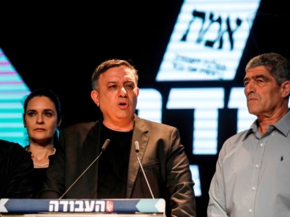 Avi Gabbay (C), chairman of Israel's Labour Party, speaks at his party's headquarters in the coastal city of Tel Aviv on election night on April 9, 2019, with Labour politician Amir Peretz (L) standing alongside him. (Photo by JALAA MAREY / AFP) (Photo credit should read JALAA MAREY/AFP/Getty Images)