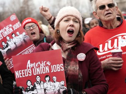 WASHINGTON, DC - FEBRUARY 26: Activists rally in front of the U.S. Supreme Court on February 26, 2018 in Washington, DC. The court is scheduled to hear the case, Janus v. AFSCME, to determine whether states violate their employees' First Amendment rights to require them to join public sector unions …