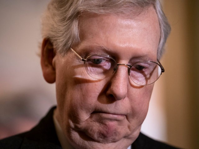 Senate Majority Leader Mitch McConnell, R-Ky., told reporters he can't say whether the Republican-controlled Senate will approve a resolution to block President Donald Trump's emergency declaration on immigration, during a news conference after a closed-door GOP meeting with Vice President Mike Pence, on Capitol Hill in Washington, Tuesday, Feb. 26, …