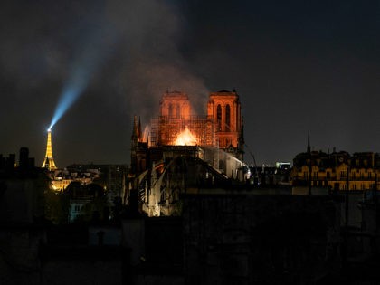 PARIS, FRANCE - APRIL 15: Smoke and flames rise from Notre-Dame Cathedral on April 15, 201