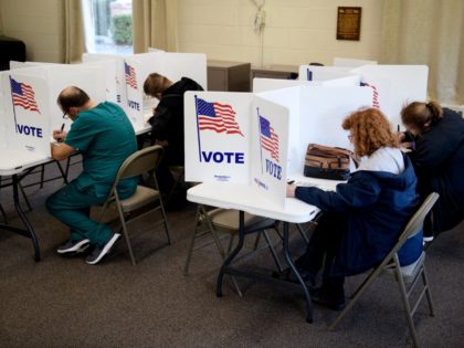 ZANESVILLE, OH - NOVEMBER 06: People cast their votes at the Central Trinity United Methodist Church polling location on November 6, 2018 in Zanesville, Ohio. Turnout is expected to be high nationwide as Democrats hope to take back control of at least one chamber of Congress. (Photo by Justin Merriman/Getty …
