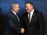 Israel's Prime minister of Benjamin Netanyahu (L) shakes hands with US Secretary of State Mike Pompeo as they talk to the press on the sidelines of a session at the conference on Peace and Security in the Middle east in Warsaw, on February 14, 2019. (Photo by Janek SKARZYNSKI / …
