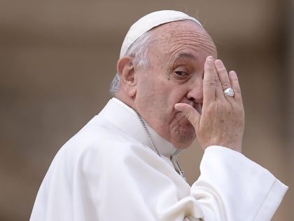 Pope Francis leaves at the end of his weekly general audience at St Peter's square on October 21, 2015 at the Vatican. The Vatican dismissed an Italian media report that Pope Francis has a treatable brain tumour as 'unfounded and seriously irresponsible.' Quotidiano Nazionale (QN), the newspaper which made the …