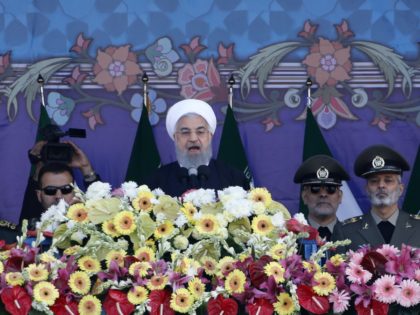 Iranian President Hassan Rouhani delivers a speech during a parade on the occasion of the country's Army Day on April 18, 2018, in Tehran. / AFP PHOTO / ATTA KENARE (Photo credit should read ATTA KENARE/AFP/Getty Images)
