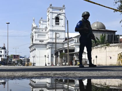 A security personnel stands guard near St. Anthony's Shrine in Colombo on April 24, 2019,
