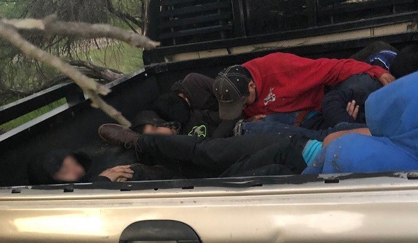 Migrants packed like cargo in the rear of a pick-up truck discovered by Border Patrol agents near Oilton, Texas. (Photo: U.S. Border Patrol/Laredo Sector)