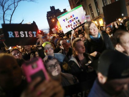 Hundreds protest a Trump administration announcement this week that rescinds an Obama-era order allowing transgender students to use school bathrooms matching their gender identities, at the Stonewall Inn on February 23, 2017 in New York City. Activists and members of the transgender community gathered outside the historic LGTB bar to …