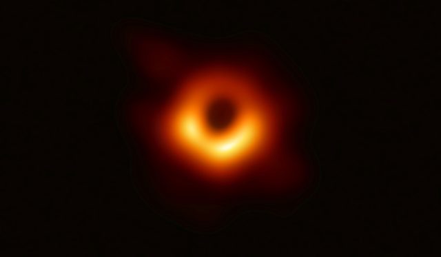Astronomers unveil the first image of a black hole