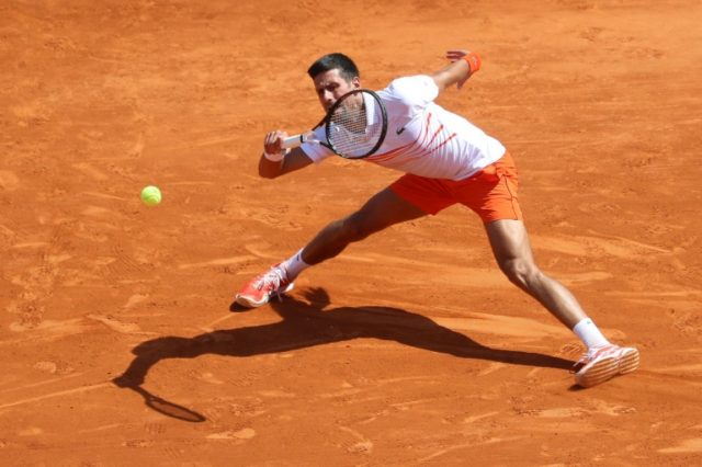 Djokovic knocked out as 'lucky' Nadal battles on in Monte Carlo