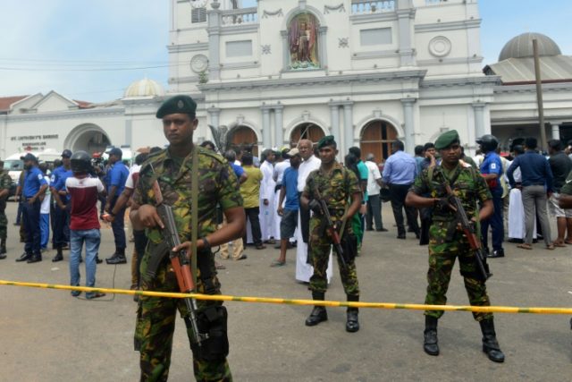 Blasts at Sri Lanka hotels and churches kill 156