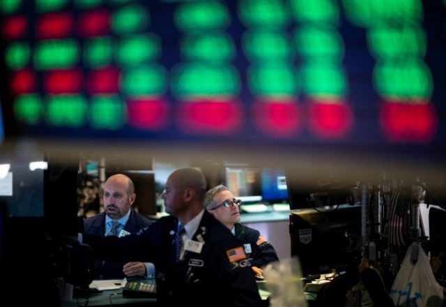 World stocks mostly down amid mixed US earnings results