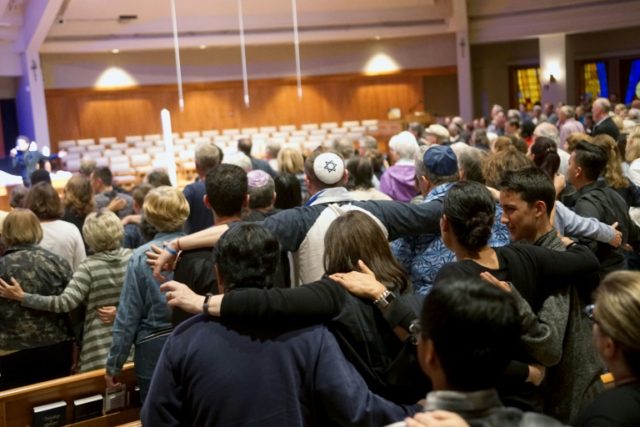 Rabbi wounded in US synagogue shooting says Jews won't be cowed