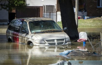 10,000 evacuated in Canada floods as rescuers search for pets