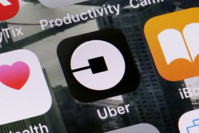 Uber Safety Uber App This Tuesday, June 12, 2018, file photo shows the Uber app on a phone in New York. Uber on Thursday, April 18, 2019, said that it is releasing a new feature to help riders ensure they’re getting into the right vehicles. The development comes several weeks after a University of South Carolina student was killed after getting into a car she had mistaken for the Uber ride she hailed. (AP Photo/Richard Drew, File) The Associated Press