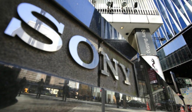Japan Earns Sony In this Feb. 2, 2017, file photo, people are reflected on a wall of the Sony showroom building at Ginza shopping district in Tokyo. Sony has reverted to profitability for the quarter through March, boosted by robust demand for game software and network services, as well as gains from Spotify, according to its report released by Friday, April 26, 2019. (AP Photo/Shizuo Kambayashi, File) The Associated Press
