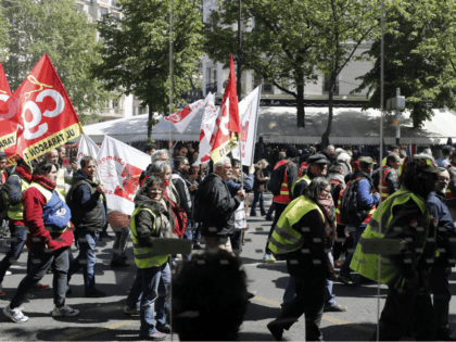 Yellow Vest demonstrators march in Paris, during another protest Saturday April 27, 2019.