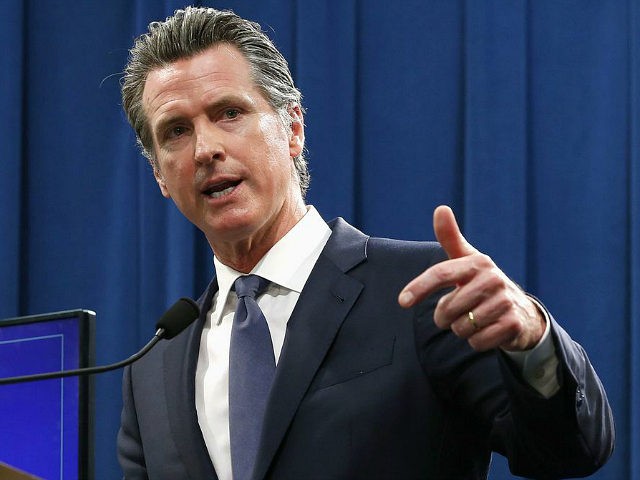 FILE - In this May 9, 2019 file photo Gov. Gavin Newsom discusses his revised 2019-2020 state budget during a news conference in Sacramento, Calif. The state Senate rejected Newsom's budget proposal Wednesday, May 15, 2019, that would put a tax on most residential water bills to improve drinking water …