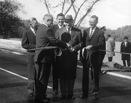 President Dwight D. Eisenhower participates in the ribbon-cutting ceremony opening the new extension to the George Washington Memorial Parkway on November 3, 1959.