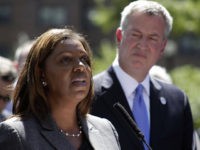 New York City Public Advocate Letitia James, left, speaks during a press conference, Thursday, Aug. 28, 2014, in Brooklyn as New York City Mayor Bill de Blasio watches from behind. De Blasio discussed preparations for the opening of the city's universal pre-kindergarten program one day after Comptroller Scott Stringer said …