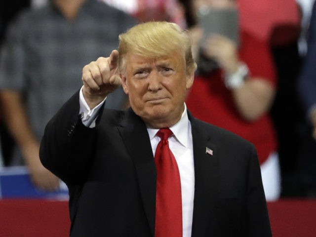 President Donald Trump points during a campaign rally Wednesday, Oct. 31, 2018, in Estero, Fla. (AP Photo/Chris O'Meara)