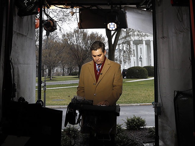 CNN's Jim Acosta waits to make a report with the White House in the background, Friday March 22, 2019, in Washington, as news breaks that the special counsel Robert Mueller has concluded his investigation into Russian election interference and possible coordination with associates of President Donald Trump. The Justice Department …