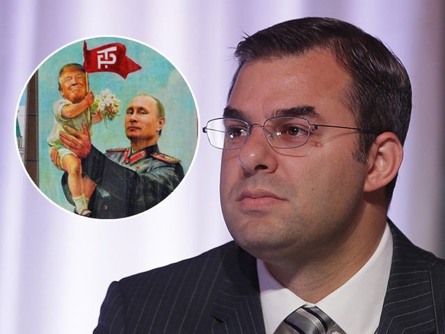 (INSET: a drawing depicting Russian President Vladimir Putin holding a baby with the face of US President Donald Trump) U.S. Rep. Justin Amash, R-Mich., is seen during a congressional panel at the 2016 Mackinac Republican Leadership Conference, Saturday, Sept. 19, 2015, in Mackinac Island, Mich. (AP Photo/Carlos Osorio)
