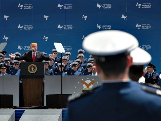 U.S. President Donald Trump, left, speaks during the Air Force Academy 2019 graduation ceremony in Colorado Springs, Colorado, U.S., on Thursday, May 30, 2019. The Trump administration will formally notify Congress on Thursday it's moving forward with its plan to get Nafta approved, a move that may raise pressure on Democrats at …