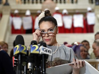 Actress Alyssa Milano speaks after delivering a letter to Gov. Brian Kemp's office de