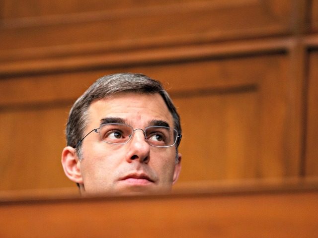 House Oversight and Reform National Security subcommittee member Rep. Justin Amash, R-Mich., watches from the dais on Capitol Hill in Washington, Wednesday, May 22, 2019, during the House Oversight and Reform National Security subcommittee hearing on "Securing U.S. Election Infrastructure and Protecting Political Discourse." (AP Photo/Carolyn Kaster)