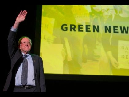 Democratic presidential candidate Sen. Bernie Sanders, I-Vt., walks onstage to address The Road to the Green New Deal Tour final event at Howard University in Washington, Monday, May 13, 2019. (AP Photo/Cliff Owen)