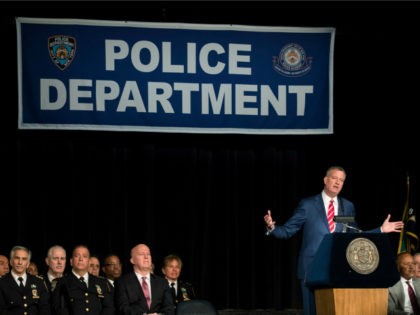 New York City Mayor Bill De Blasio delivers remarks during a police academy graduation cer