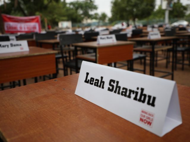 Names of the remaining Chibok schoolgirls are displayed with their desk on April 14, 2019,