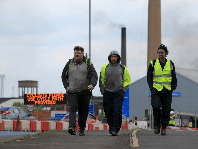 Workers leave from British Steel's Scunthorpe plant in north Lincolnshire, north east Engl