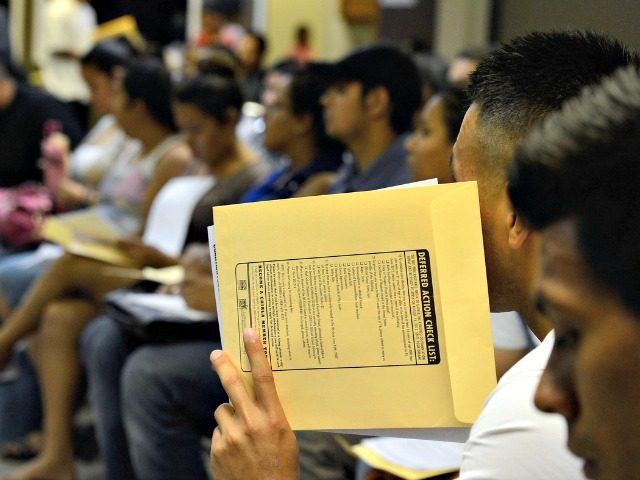People at the Coalition for Humane Immigrant Rights of Los Angeles attend an August 2012 orientation class for filling out their application for the Deferred Action for Childhood Arrivals program. Kevork Djansezian/Getty Images