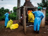 Health workers burn medical waste generated during care of patients with Ebola virus, on August 21, 2018 in Mangina, near Beni, in the North Kivu province. - Sixty-one people have died in the latest outbreak of Ebola in the Democratic Republic of Congo (DRC), the authorities said, adding that four …