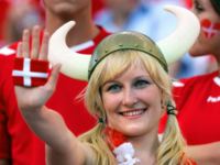 PORTO, Portugal: A Danish supporter cheers her team, 27 June 2004 at Dragao stadium in Porto, before the beginning of the Euro 2004 quarter final match between Czech Republic and Denmark at the European Nations championship in Portugal. AFP PHOTO Francois-Xavier MARIT (Photo credit should read FRANCOIS XAVIER MARIT/AFP/Getty Images)