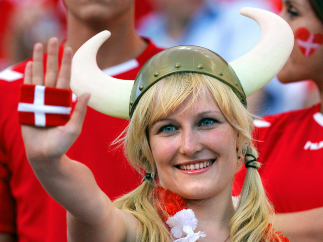 PORTO, Portugal: A Danish supporter cheers her team, 27 June 2004 at Dragao stadium in Por