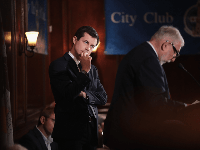 Democratic presidential candidate and South Bend, Indiana Mayor Pete Buttigieg listens to