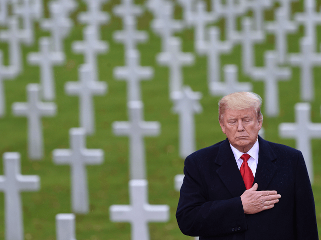 TOPSHOT - US President Donald Trump takes part in a US ceremony at the American Cemetery of Suresnes, outside Paris, on November 11, 2018 as part of Veterans Day and commemorations marking the 100th anniversary of the 11 November 1918 armistice, ending World War I. (Photo by SAUL LOEB / AFP) (Photo credit should read SAUL LOEB/AFP/Getty Images)