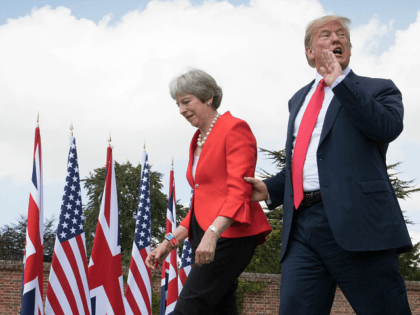 AYLESBURY, ENGLAND - JULY 13: Prime Minister Theresa May and U.S. President Donald Trump make their way to a joint press conference following their meeting at Chequers on July 13, 2018 in Aylesbury, England. US President, Donald Trump held bi-lateral talks with British Prime Minister, Theresa May at her grace-and-favour …