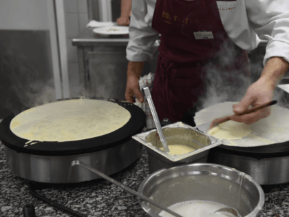 A competitor attends the contest of the best crepe maker of Brittany at the Apprentice tra