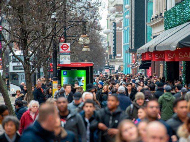 Crowds of shoppers take to Oxford Street in central London on December 26, 2018, as Boxing