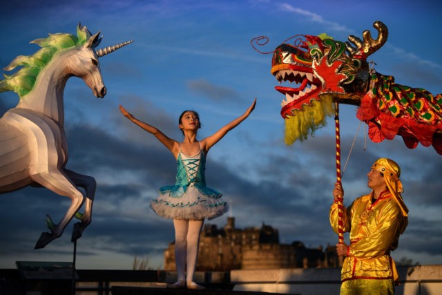 EDINBURGH, SCOTLAND - JANUARY 14: Nina Sun stands beside a unicorn lantern and a Chinese d