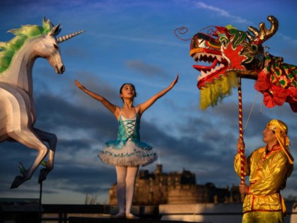 EDINBURGH, SCOTLAND - JANUARY 14: Nina Sun stands beside a unicorn lantern and a Chinese d